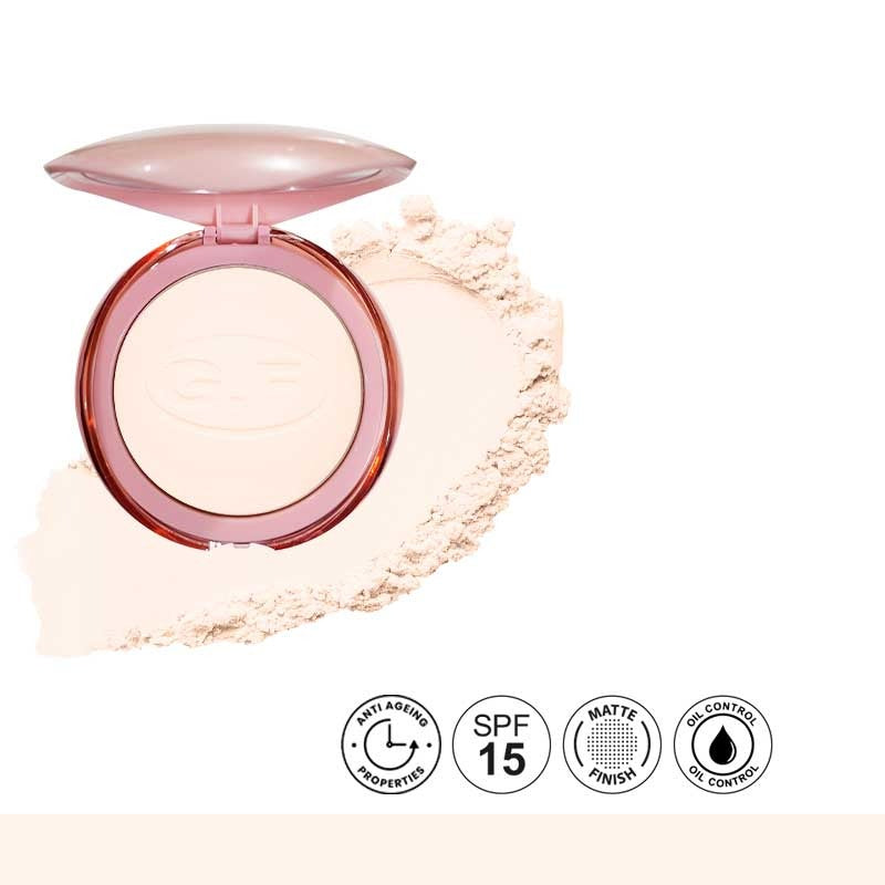 Compact powder with a pink case on a white background, featuring SPF 15 and matte finish icons.