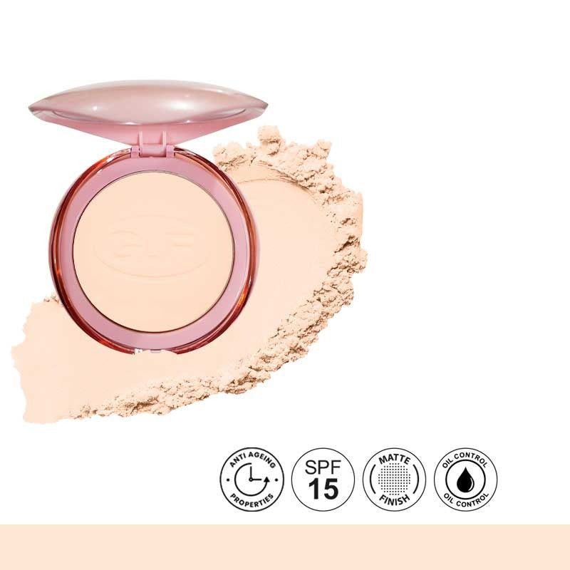 Compact powder with a pink case on a white background, featuring SPF 15 and matte finish icons.