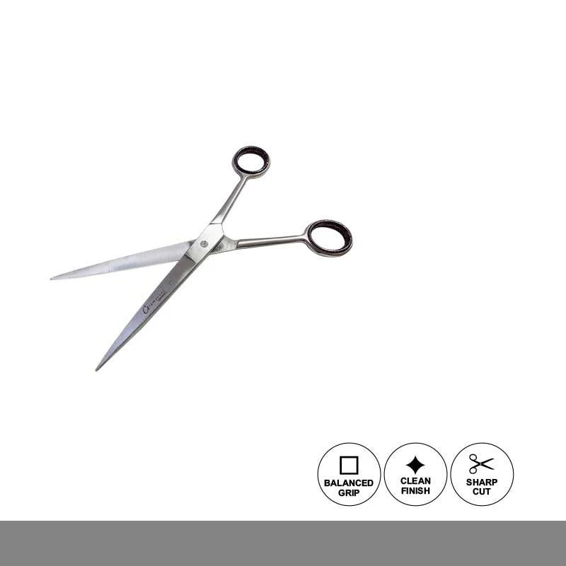 Pair of scissors with black handles on a white background, featuring icons for balanced grip, clean finish, and sharp cut.