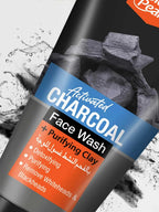 Activated charcoal face wash bottle with label on a textured background