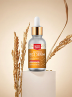 Bottle of Golden Bear Brightening Rice Serum with wheat stalks on a beige background
