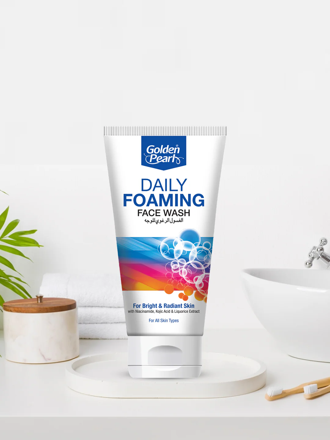 Tube of Golden Pearls Daily Foaming Face Wash on a bathroom counter with a white background