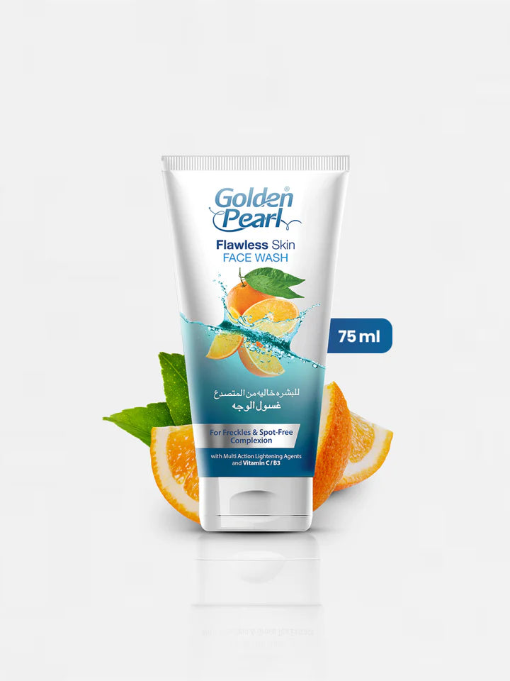 Golden Pearl Flawless Skin Face Wash tube with oranges and leaves on a white background