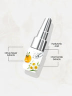 Skincare serum bottle with labeled ingredients on a white background