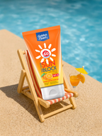 Sunscreen bottle on a miniature deck chair by a poolside
