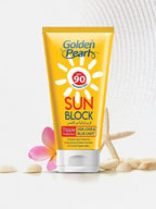 Golden Pearl sun block cream tube with SPF 90 on a white background