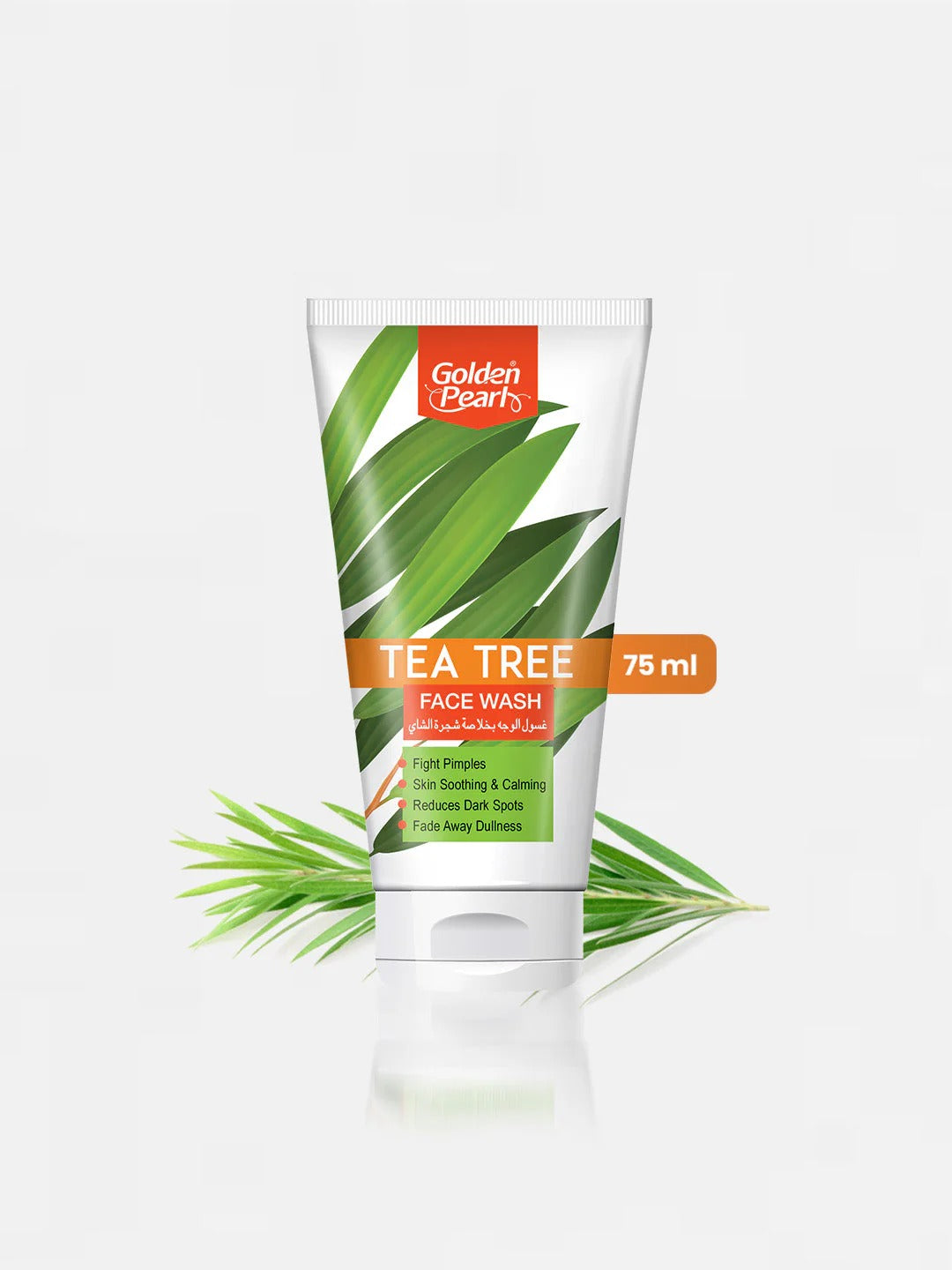 Tube of Golden Pearl Tea Tree Face Wash with tea tree leaves on a white background