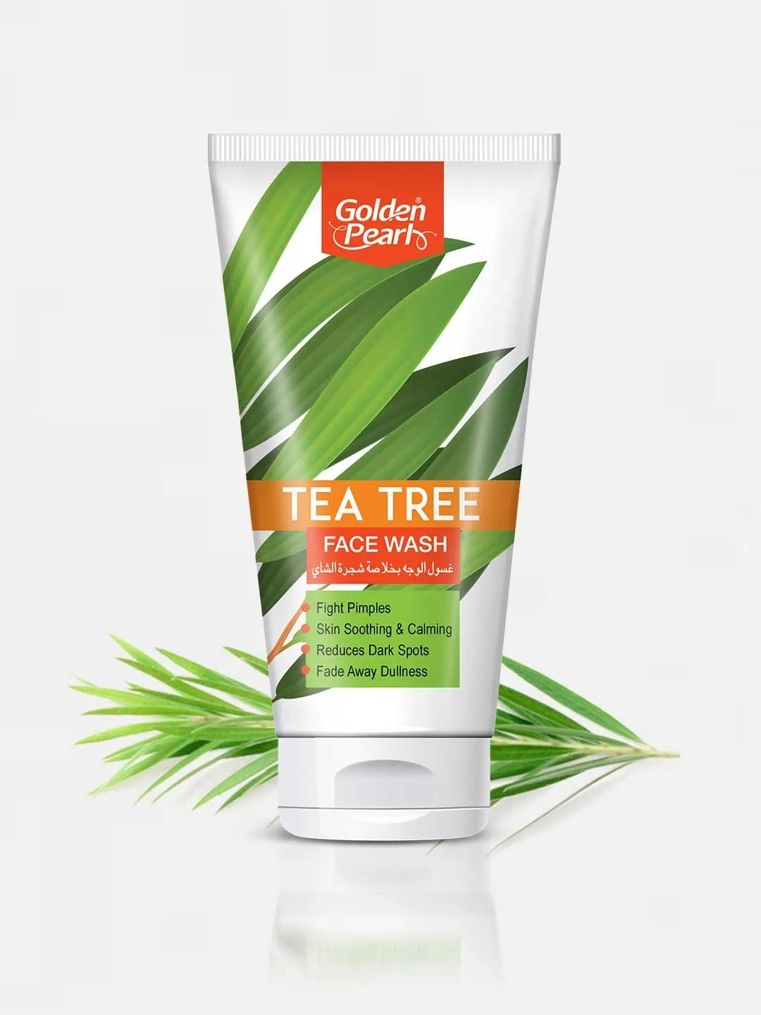 Tube of Golden Pearl Tea Tree Face Wash with green leaves on a white background