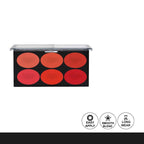 Makeup palette with red shades and brand name on a white background