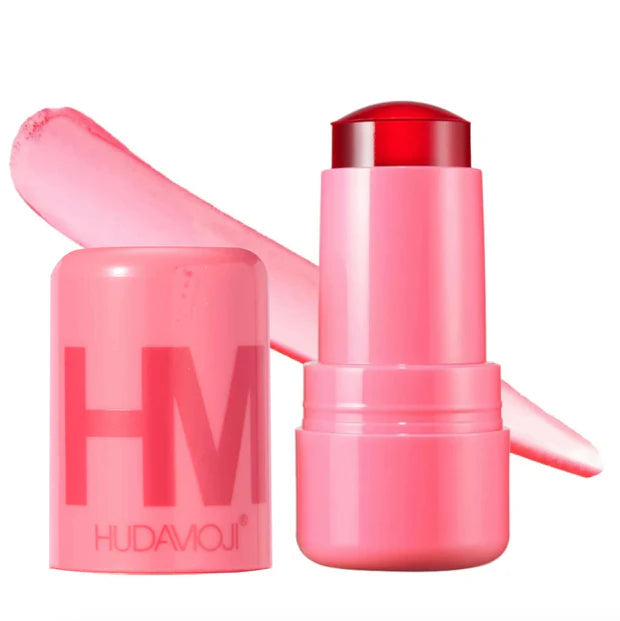 Pink makeup stick with red cap and 'HM' branding on a white background