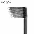L’oreal Lash Paradise Volumising Waterproof Mascara Black brush with black bristles on a white background, L'Oreal Paris logo visible.