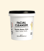 MHOD's Facial Cleanser container with black lid on a beige background