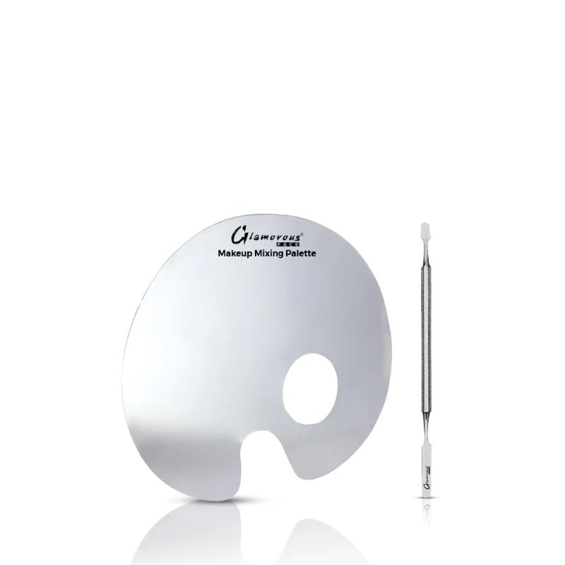 Makeup mixing palette with a small brush on a white background