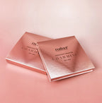 Two rose gold 'naliao' highlight palette boxes on a pink background