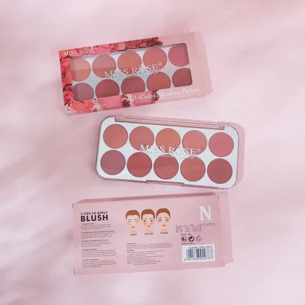 Miss Rose blush palette with packaging on a pink background