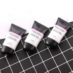 Three tubes of Miss Rose Photo Finish Foundation Primer on a black grid background