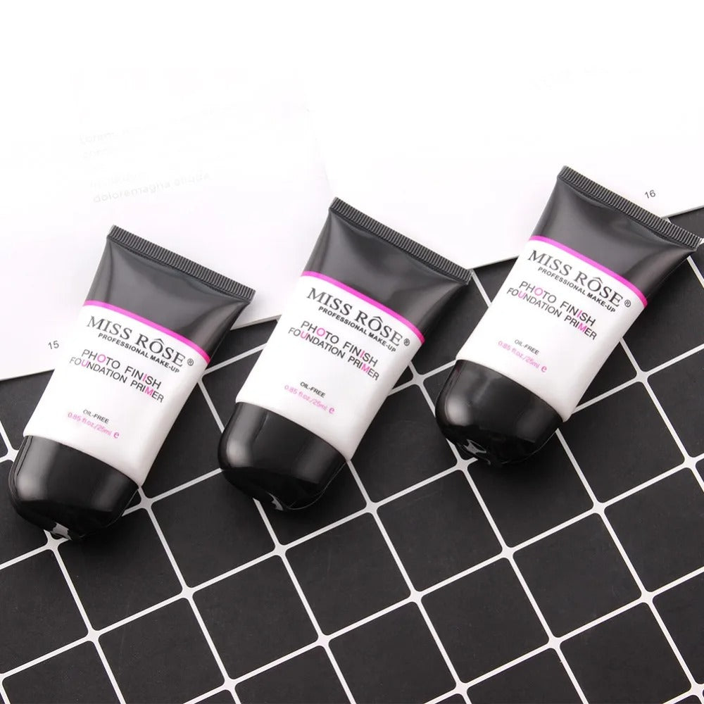 Three tubes of Miss Rose Photo Finish Foundation Primer on a black grid background