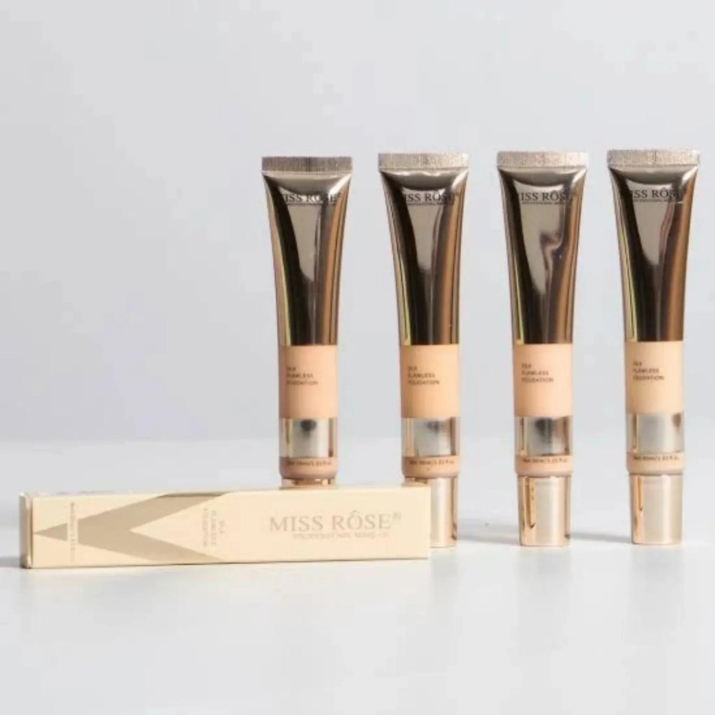 Four tubes of Miss Rose skincare product on a light gray background