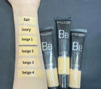 Miss Rose BB Cream tubes with color swatches on a arm against a dark background