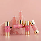 Collection of Miss Rose lip products on a pink background