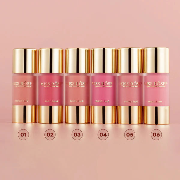 Set of Miss Rose Stain Liquid Blush with gold caps on a pink background