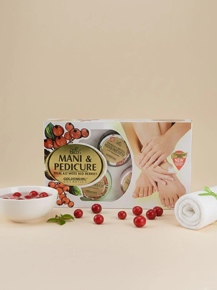 Golden Girl Mani & Pedicure Kit 5 Items with berries and towel on a beige background