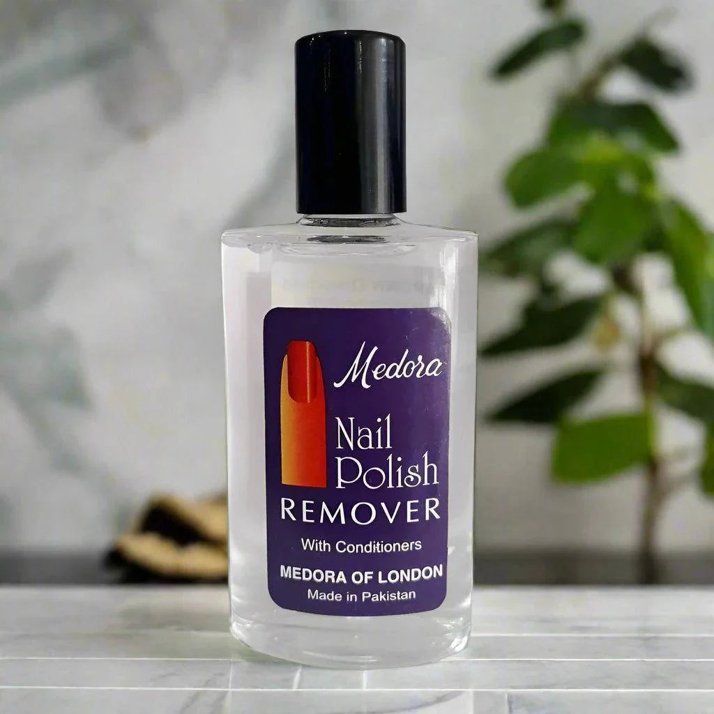 Bottle of Medora Nail Polish Remover on a marble surface with a blurred background