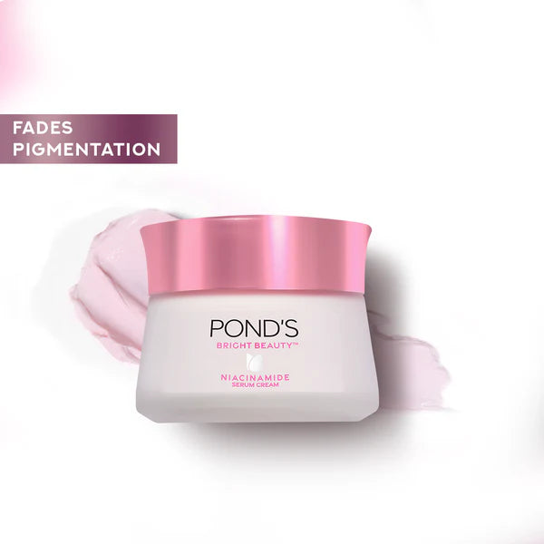 Ponds skincare cream jar with pink lid on a white background