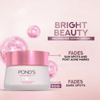 Pond's Bright Beauty Niacinamide Serum Cream jar with pink cap on a light pink background