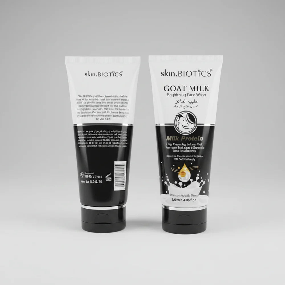 Two bottles of skin.BIOTICS Goat Milk Brightening Face Wash on a gray background