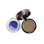 Makeup compact with blue cream and brown powder on a white background
