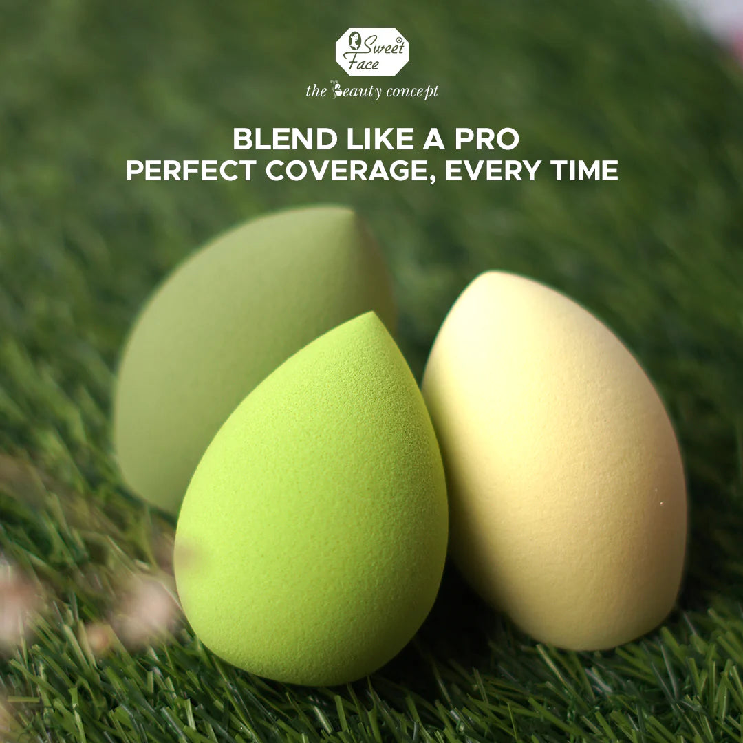 Two makeup sponges, one green and one beige, on grass with promotional text above.