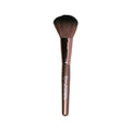 Makeup brush with a brown handle and black bristles on a white background