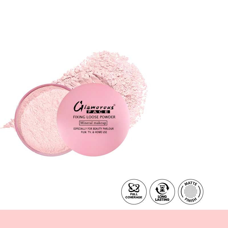 Pink powder compact with a fluffy applicator on a white background